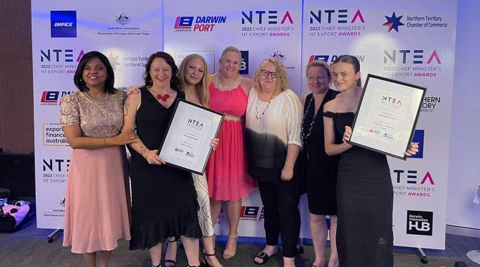 Group shot of Alana Kaye staff with their awards